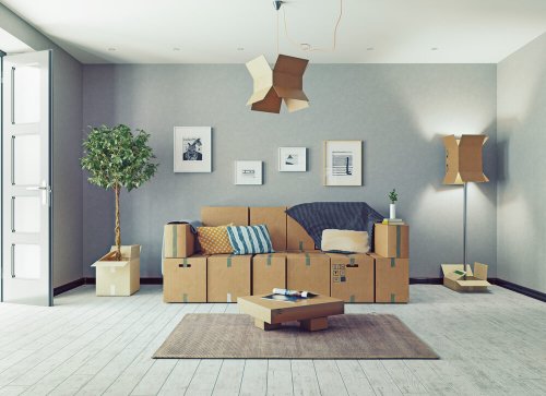 The room with card cardboard boxes instead of furniture. 3d concept