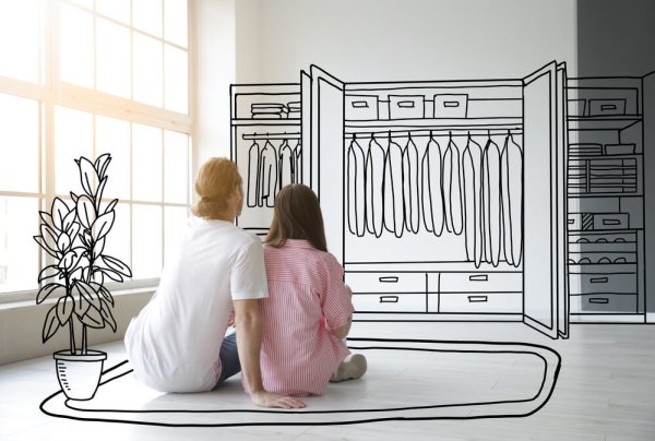 Young couple thinking about design of their new flat